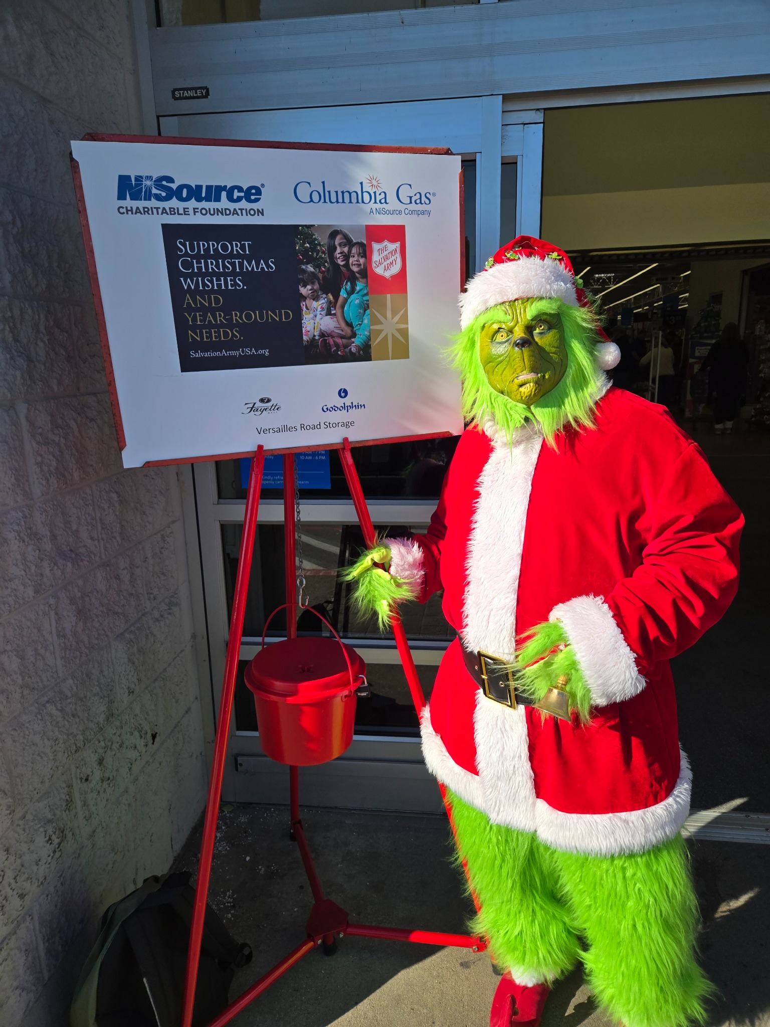 Mr. Grinch participating in a Christmas community event